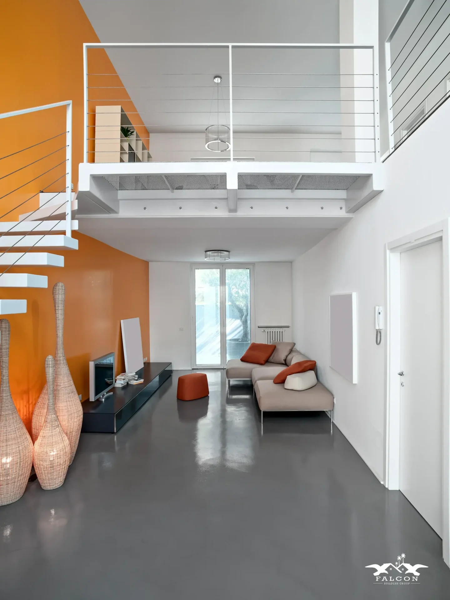 Modern ADU construction featuring open-concept interior with loft space, contemporary staircase, and compact living area design.