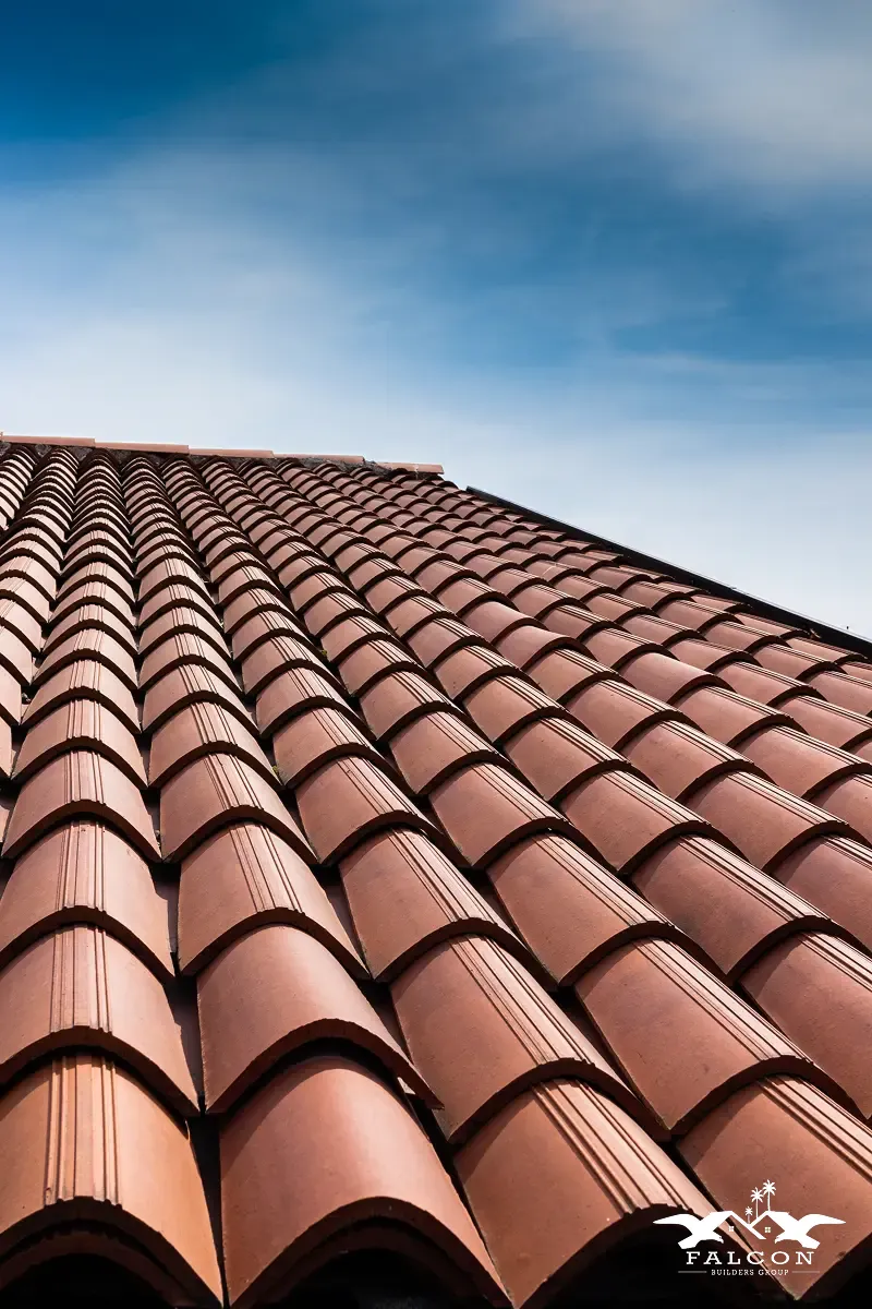 Roofing services in San Diego featuring a close-up view of durable clay roof tiles installed in a clean, uniform pattern, ideal for roof replacement, roof installation, and long-lasting roofing upgrades for homes in Southern California.