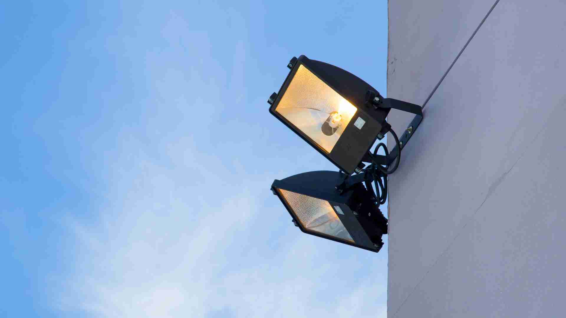 Wall-mounted floodlights as practical outdoor lighting ideas for home safety