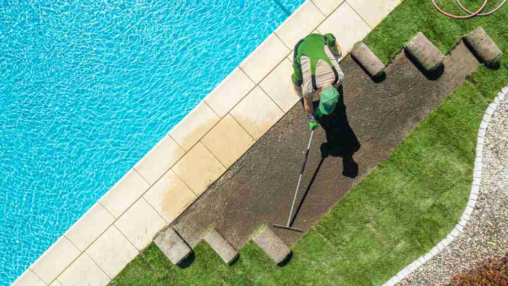 Installing artificial grass next to swimming pool for a low-maintenance yard
