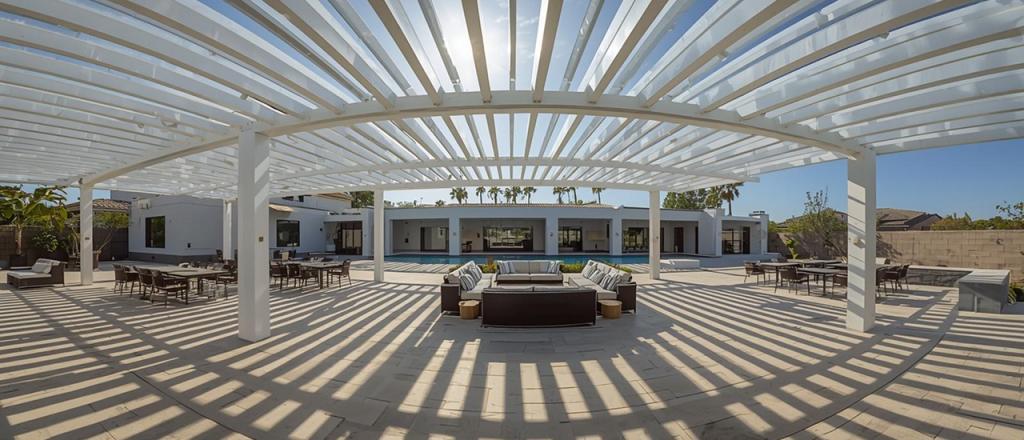 Modern wooden pergola providing shade over a seating area